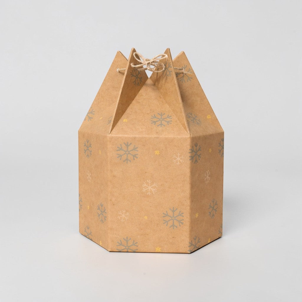 Stockka hexagonal kraft paper gift box with snowflake print and twine closure. Ideal for festive packaging.