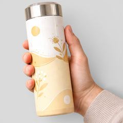 Stockka insulated stainless steel water bottle with screw-on metal cap, white and yellow floral design.