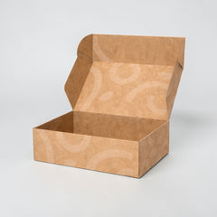 Stockka kraft corrugated cardboard shipping box with subtle arc pattern, ideal for online orders and gift packaging.
