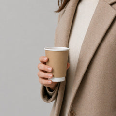 Stockka natural kraft paper cup with white rim, perfect for espresso or tea, eco-friendly design.