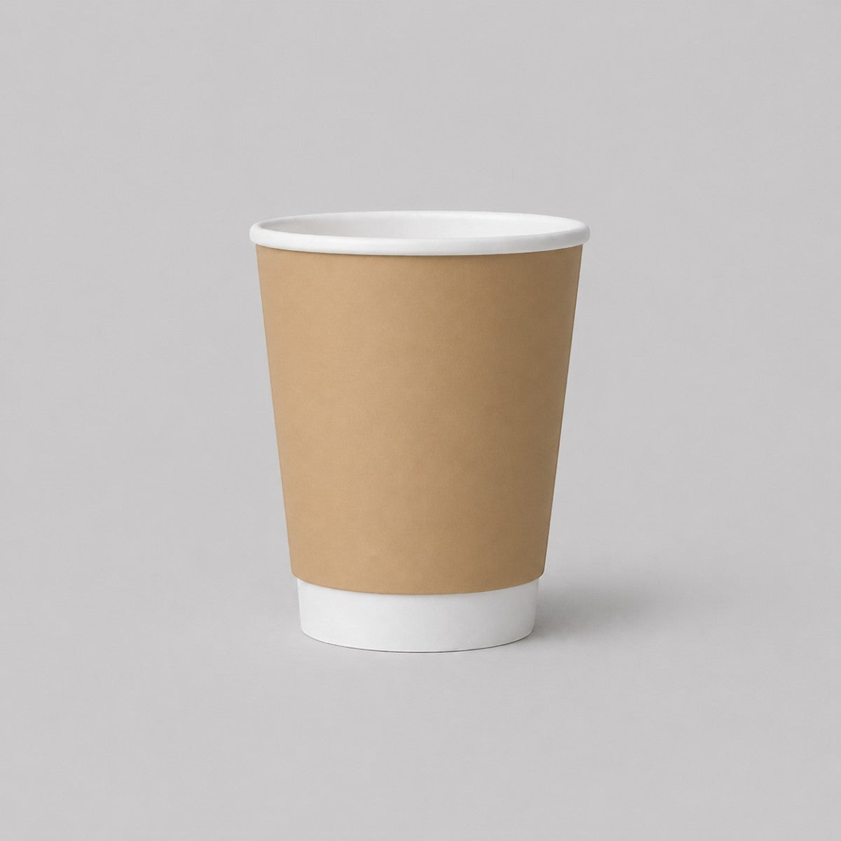 Stockka natural kraft paper cup with white rim and sleeve, ideal for espresso or tea.