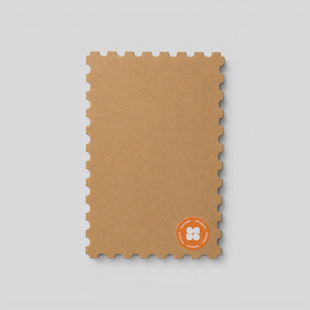 Stockka natural brown kraft paper greeting card with perforated stamp-style edges for personal messages.