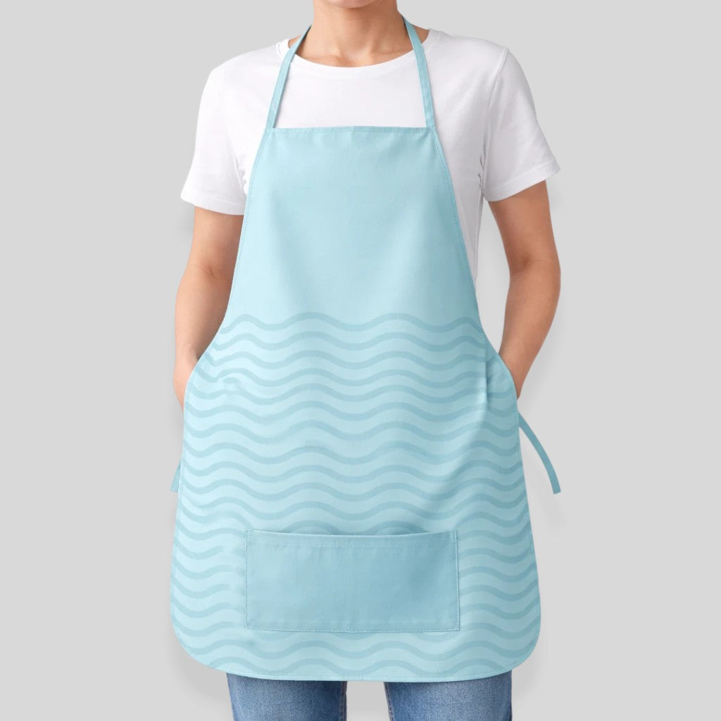 Stockka light blue cotton-polyester blend apron with rounded bottom and front pocket, wave pattern