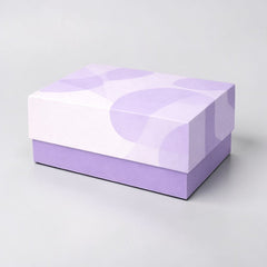 Stockka two-piece rigid cardboard gift box with separate lid and base in lilac and white with abstract pattern. Ideal for luxury packaging.