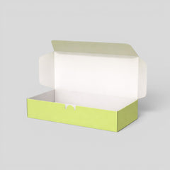 Stockka lime green rigid cardboard gift box with magnetic closure and white interior. Ideal for luxury products, gift packaging, and promotional items.