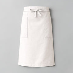 Stockka long white cotton-polyester blend waist apron with two side pockets and tie closure, ideal for restaurants and cafes.