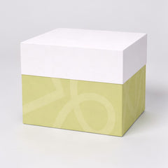 Stockka luxury gift box with removable lid, lime green with subtle pattern, white lid, premium rigid cardboard.