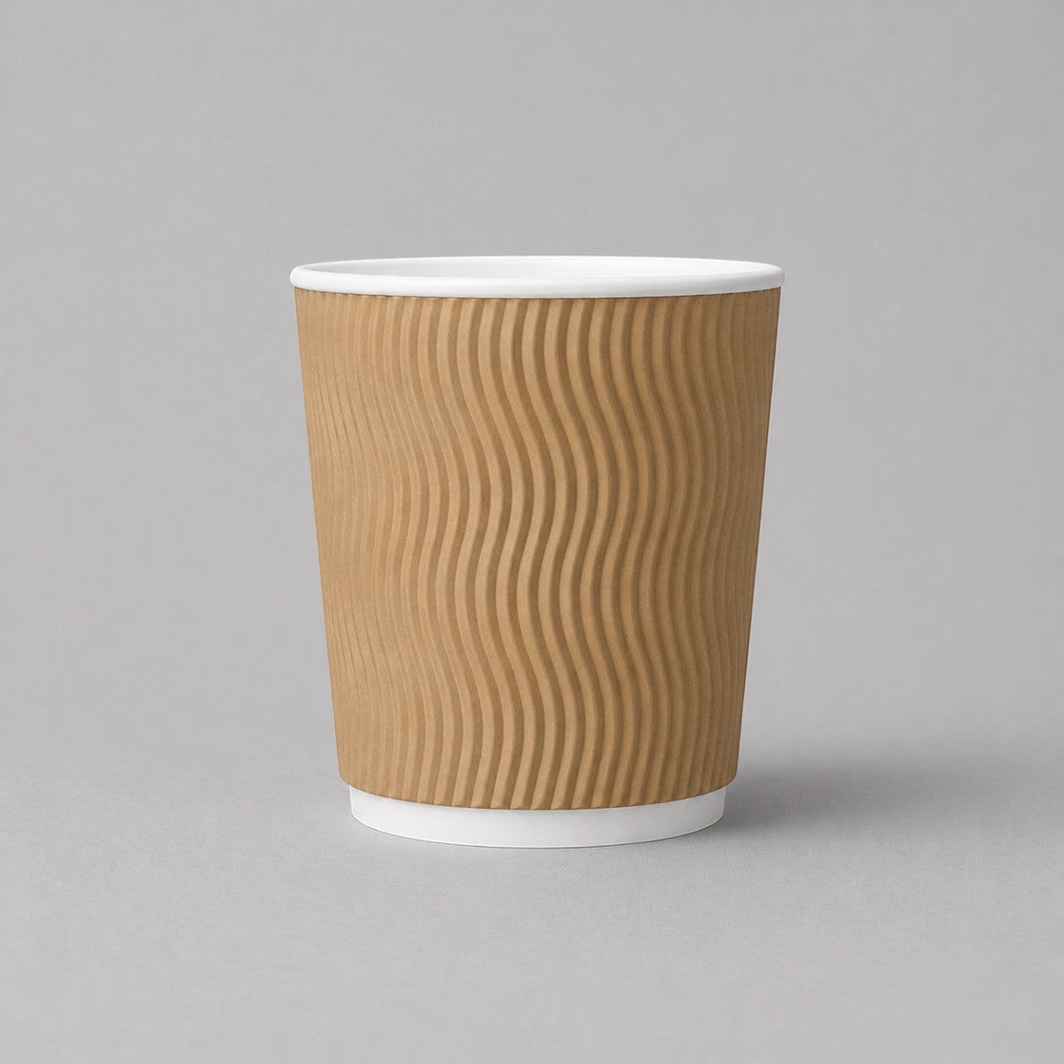 Stockka medium kraft paper cup with wavy insulated sides and white rim, no lid. Ideal for office coffee or medium hot drinks.
