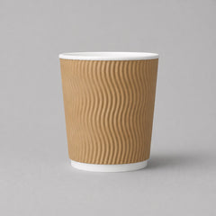 Stockka medium kraft paper cup with wavy insulated sides and white rim, no lid. Ideal for office coffee or medium hot drinks.