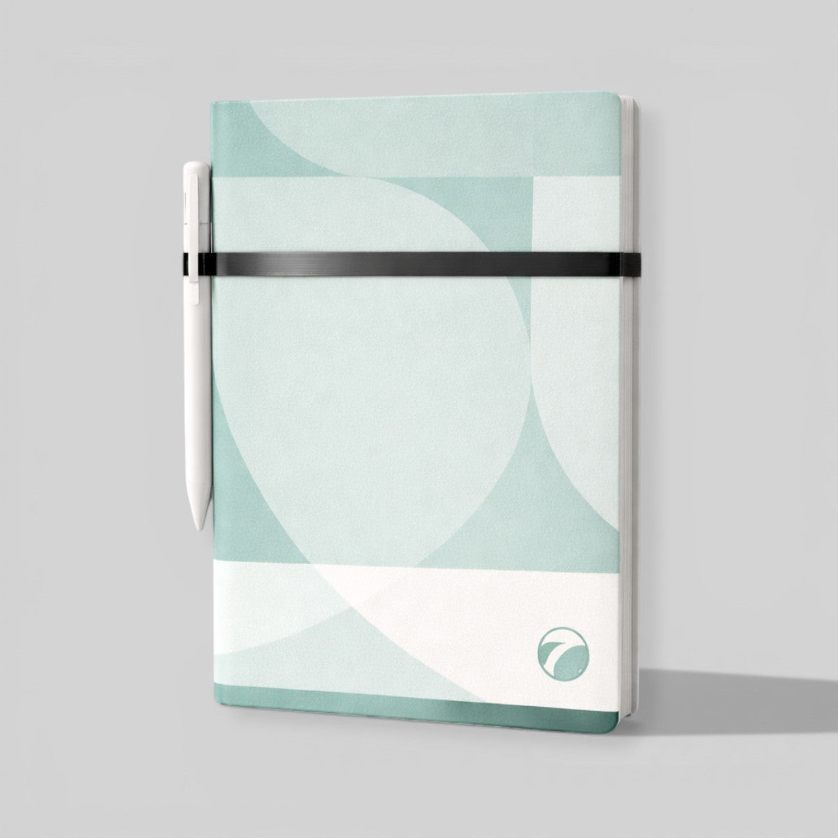 Stockka mint green abstract pattern hardcover notebook with pen holder and black elastic closure. 80 lined pages.
