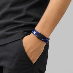 Stockka navy blue silicone NFC wristband with white swirl design and black clasp. Waterproof and durable.
