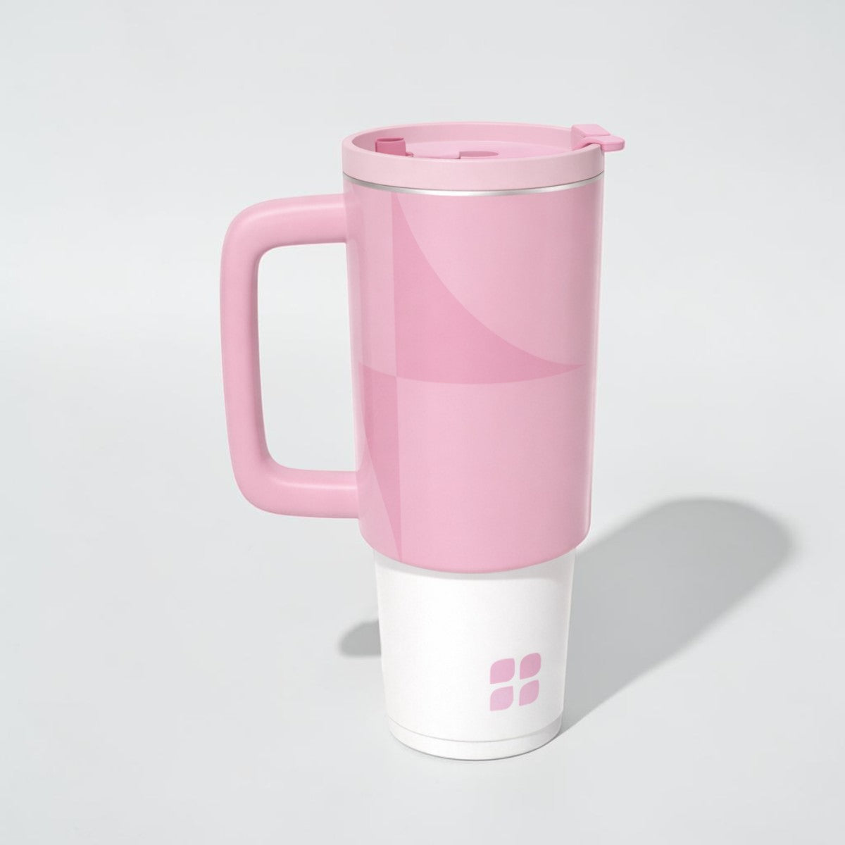 Stockka pink stainless steel thermal mug with handle and lid, double-walled for insulation.