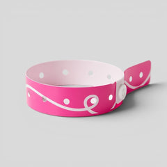 Stockka pink vinyl event wristband with white swirl design and secure snap closure. Water and tear resistant.