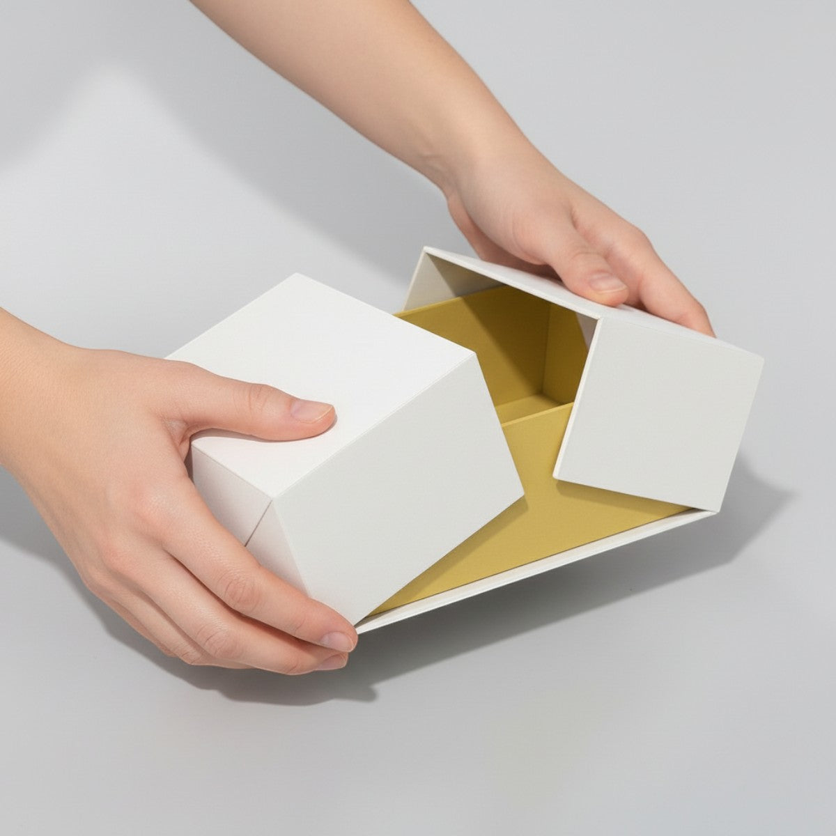 Stockka premium rigid box with double center opening, white exterior, yellow interior, ideal for luxury gifts.