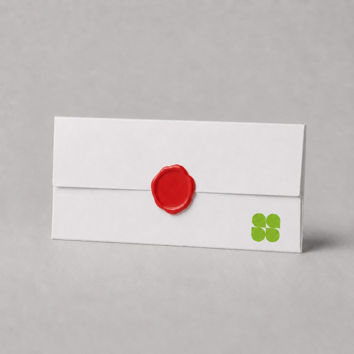Stockka premium white 250g paper envelope with a red wax seal, perfect for formal invitations and luxury stationery.