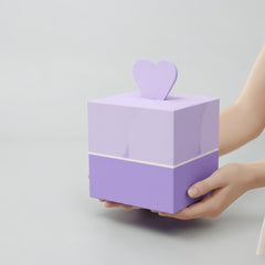 Stockka cubic gift box with a heart-shaped top, two-tone purple, made of rigid coated cardboard.