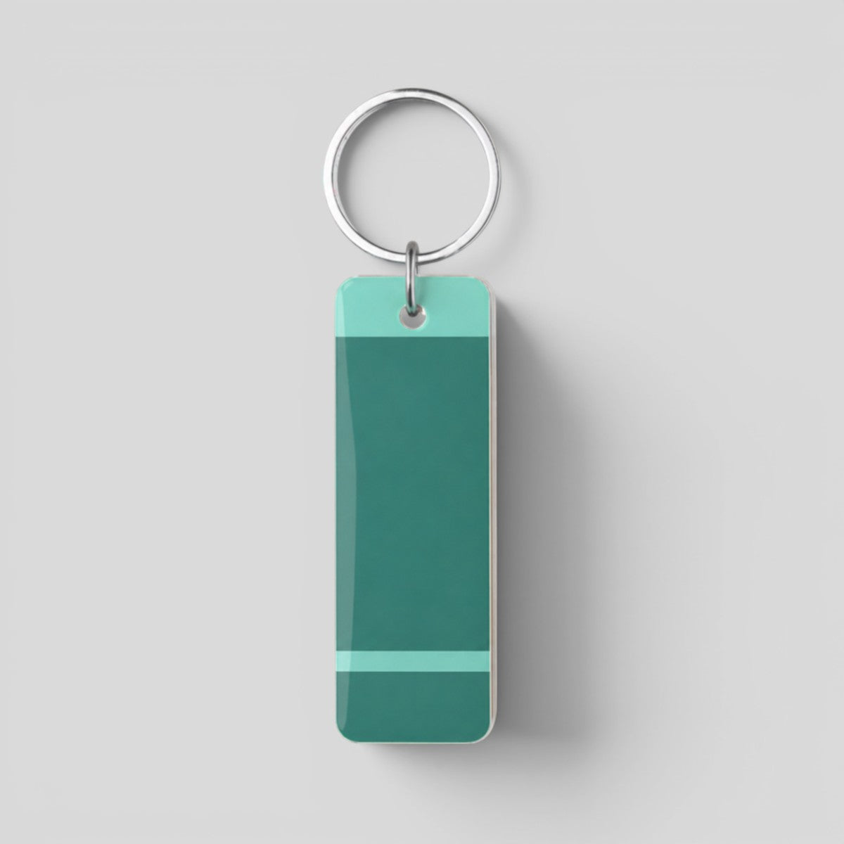 Stockka rectangular acrylic keychain with teal and light teal color blocking and metal ring. Perfect for custom logos and branding.
