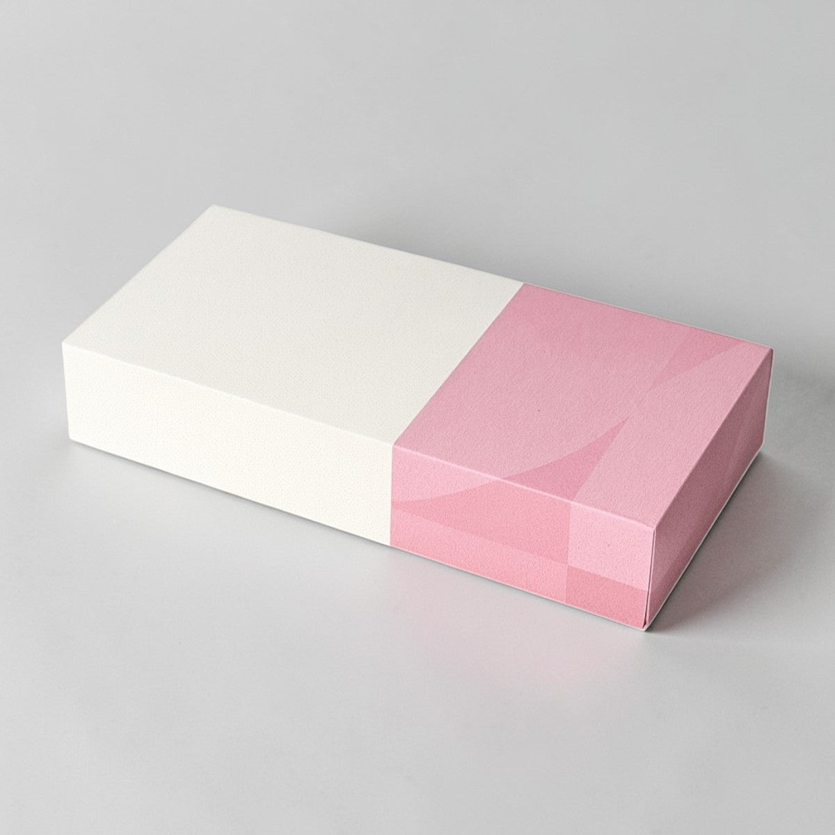 Stockka rectangular gift box, white with pink geometric pattern, rigid cardboard with lamination, ideal for cosmetics or accessories.
