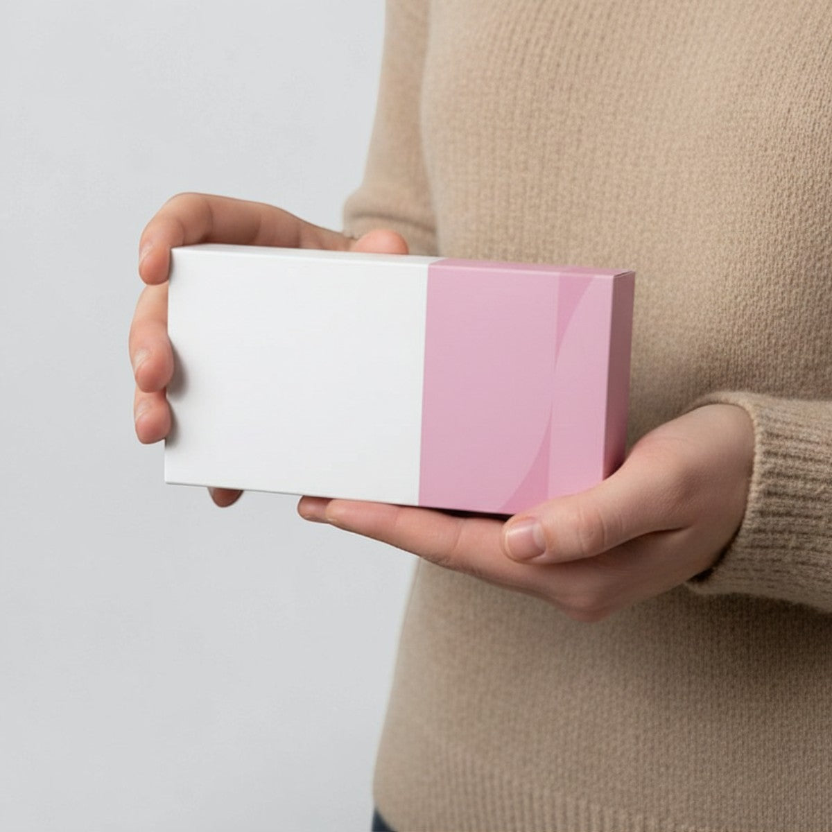 Stockka white and pink rectangular rigid gift box with clean lines and large branding area. Made of laminated cardboard.