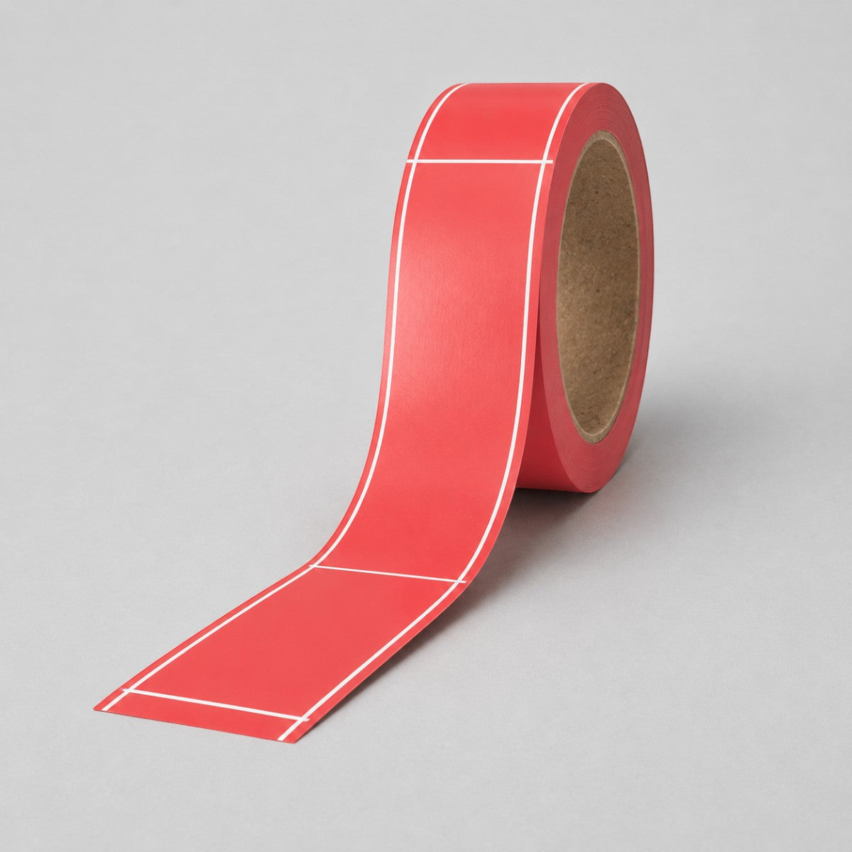 Stockka red rectangular custom label roll with white border lines, ideal for product tagging, packaging, and shipping.