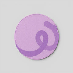 Stockka round mousepad in light purple with a darker purple swirl design. Smooth, modern surface for precise mouse movement.