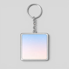 Stockka square acrylic keychain with silver metal frame and chain, featuring a gradient sky design with subtle stars.