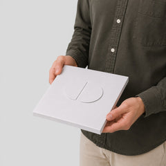Stockka white matte coated cardboard square envelope with integral tab closure for premium orders and gift cards.