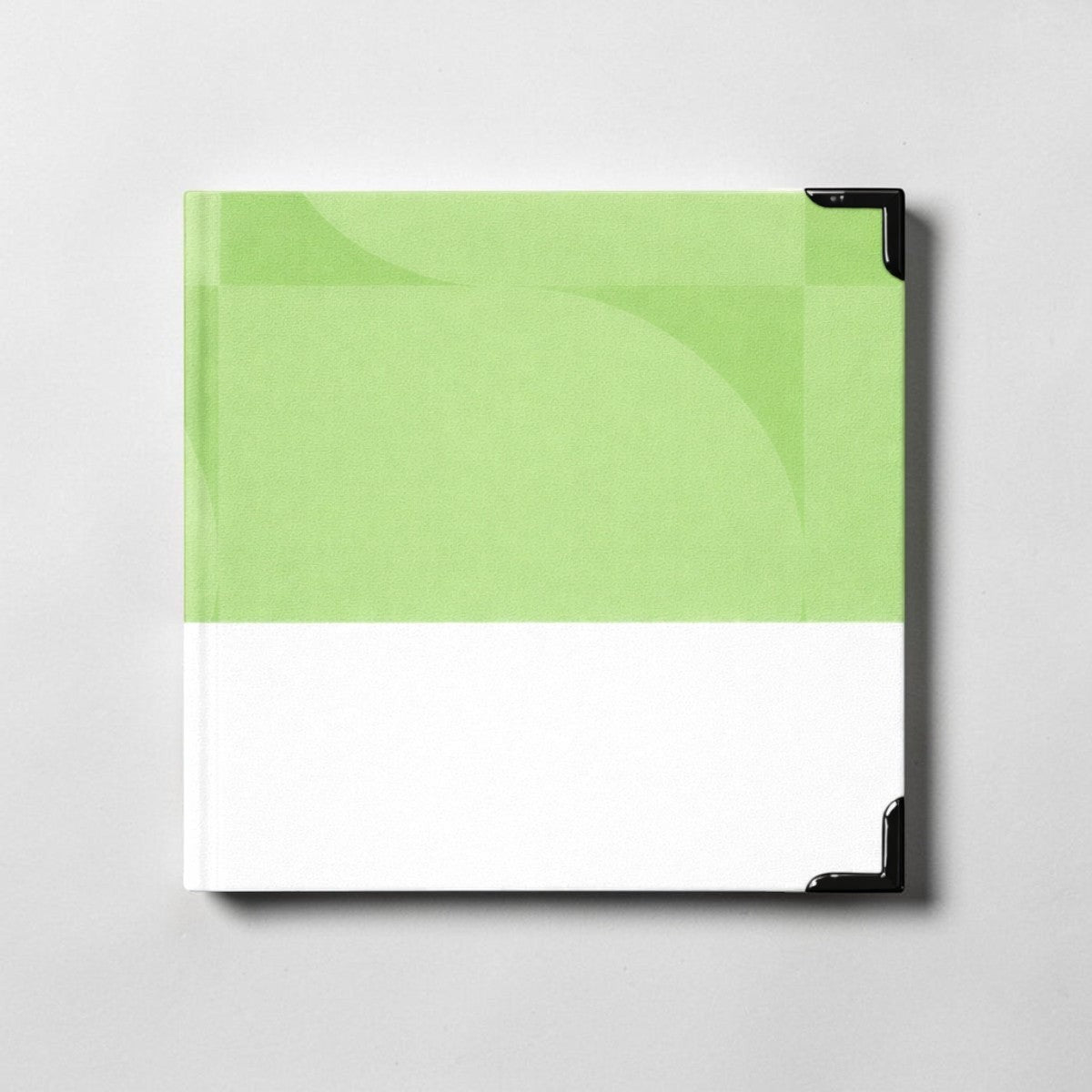 Stockka square notebook with hard cardboard cover, 80 lined pages, and a customisable light green and white design.