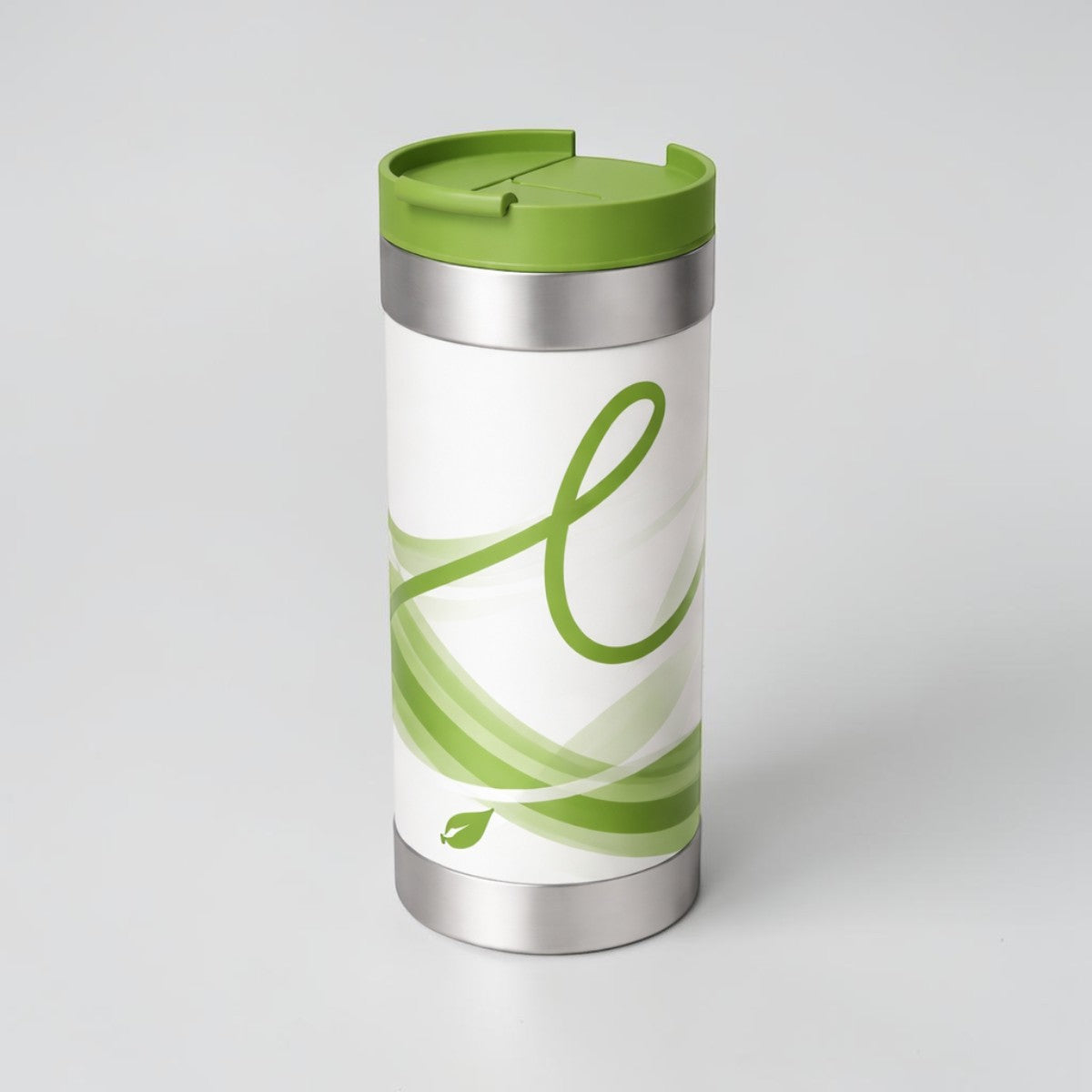 Stockka stainless steel thermal mug with green lid and swirl design, ideal for hot drinks on the go.