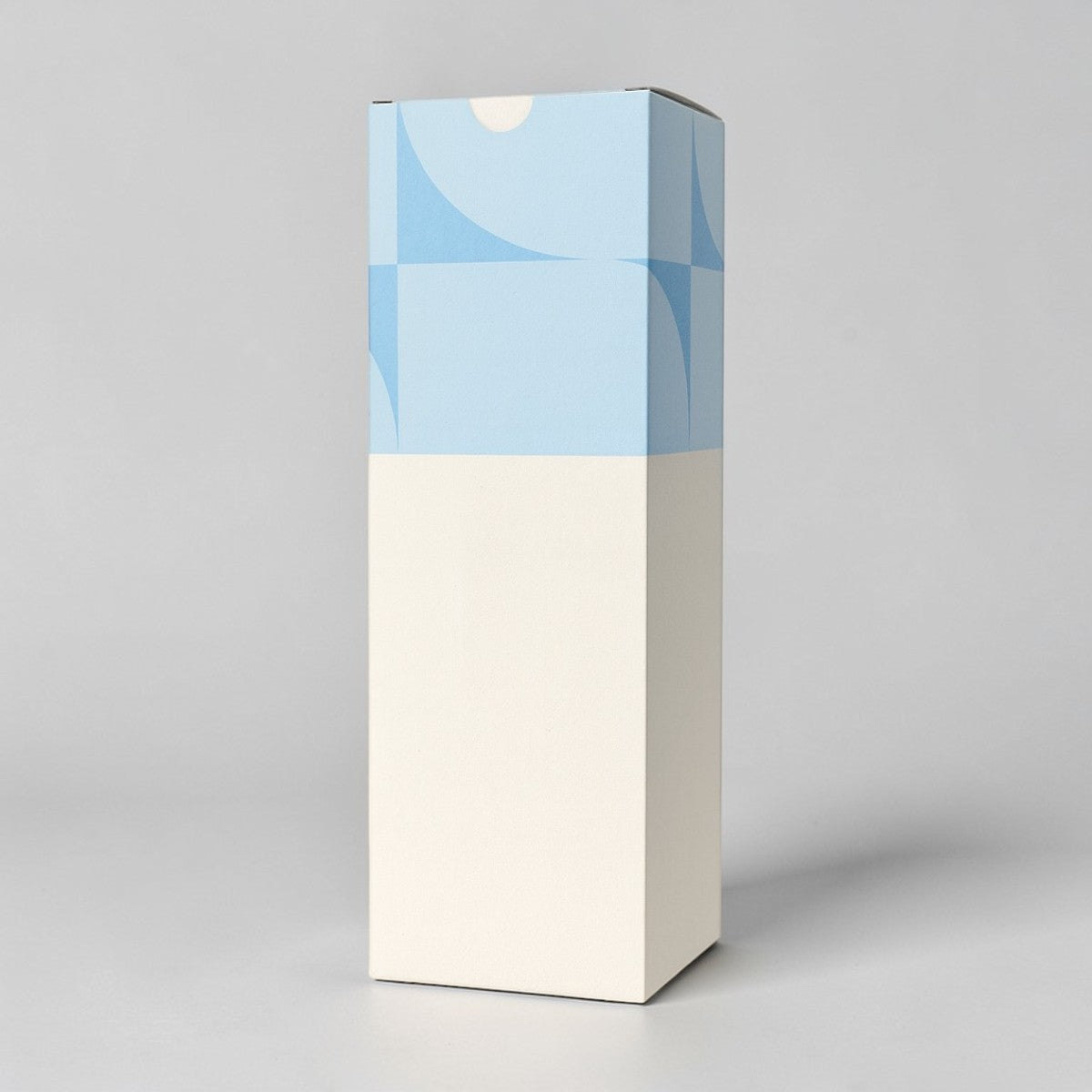 Stockka standing rectangular gift box with top closure, white with blue geometric pattern on top. Made of rigid cardboard with lamination.