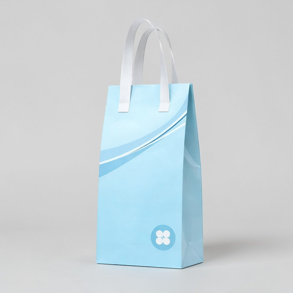 Stockka tall light blue kraft paper gift bag with white handles and a subtle wave design.