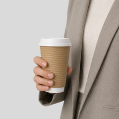 Stockka tall kraft paper cup with white lid and corrugated texture for hot drinks.