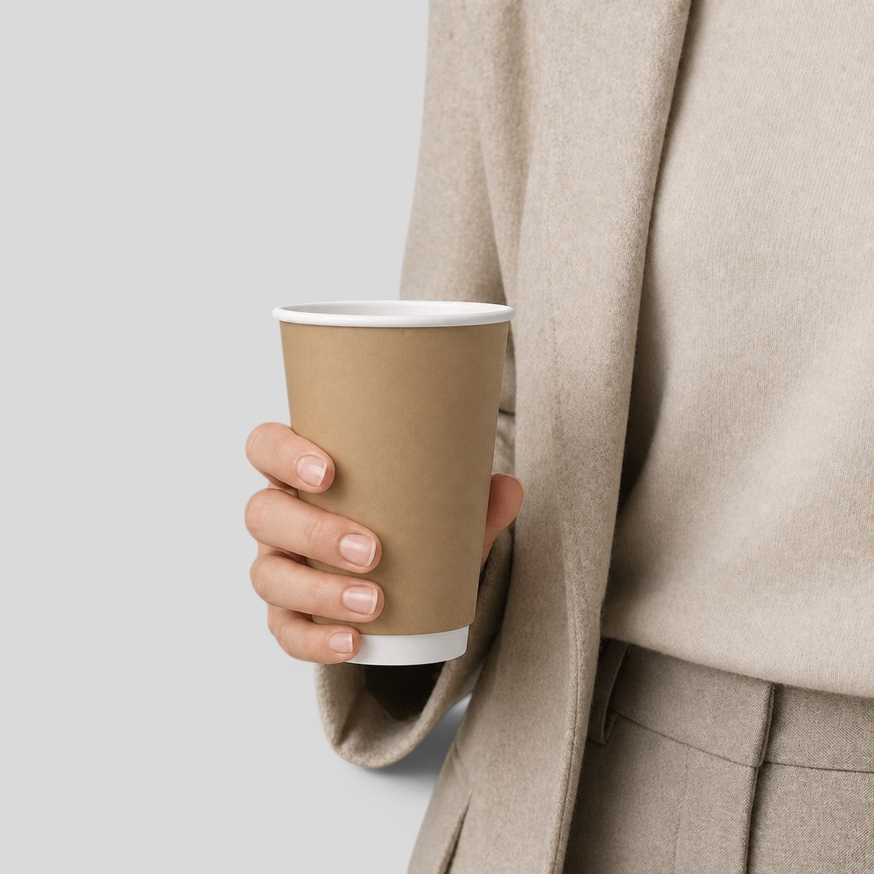 Stockka tall kraft paper cup with white interior, ideal for hot or cold drinks. Natural look, perfect for branding.