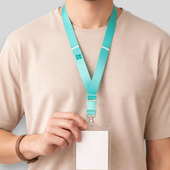 Stockka teal V-neck lanyard with detachable buckle and metal clip, made of polyester. Ideal for official events.