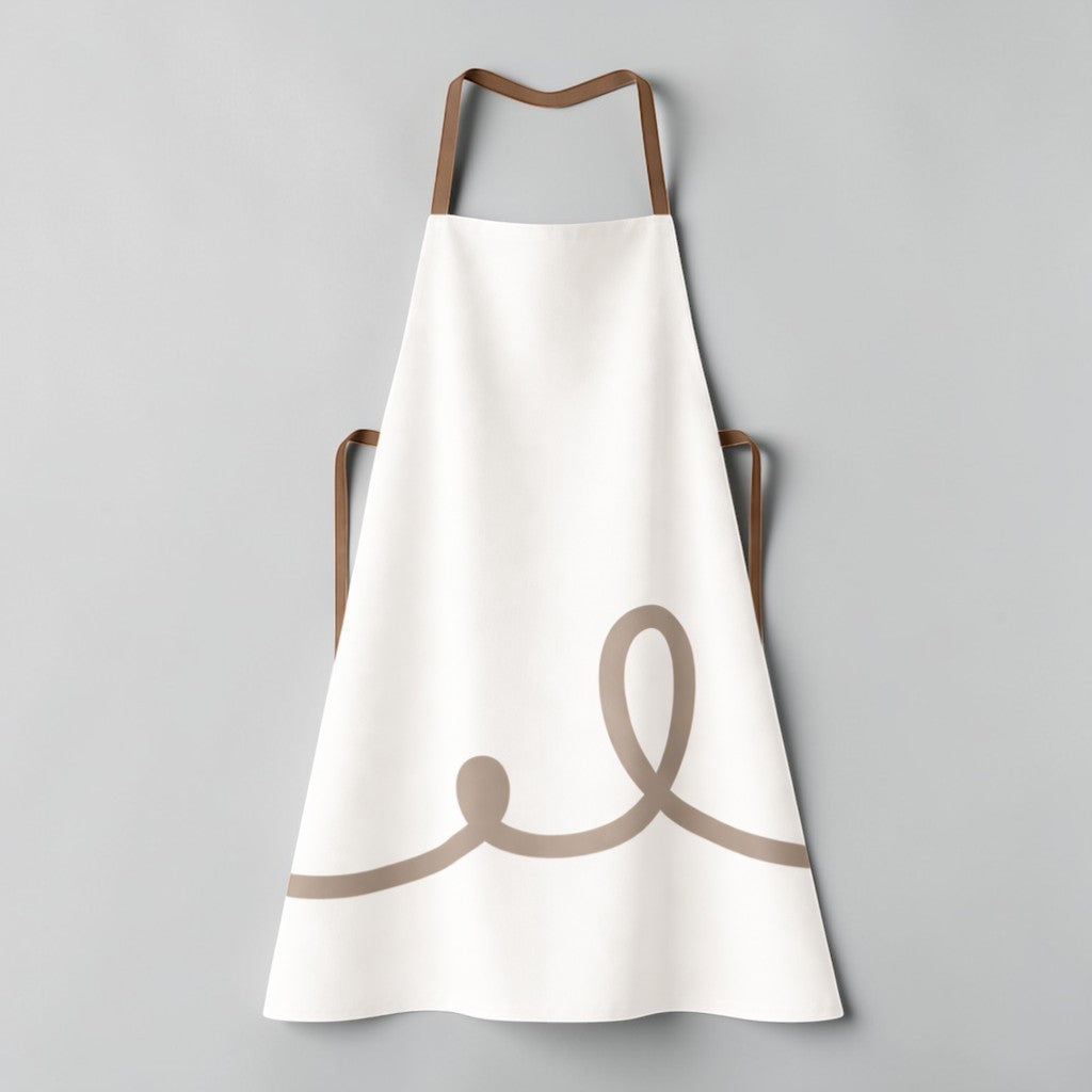 Stockka white full-length apron with brown trim and a taupe swirl graphic. Made of polyester-cotton blend.