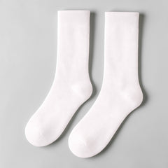 Stockka white mid-calf socks with a subtle argyle pattern, made from a soft cotton blend for everyday wear.