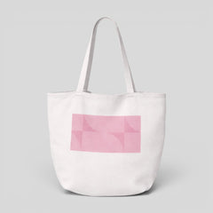 Stockka white canvas tote bag with pink geometric pattern and long shoulder straps.