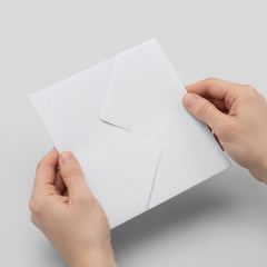 Stockka white card with diagonal inner pocket for gift cards or business cards, made of 250gsm uncoated paper.