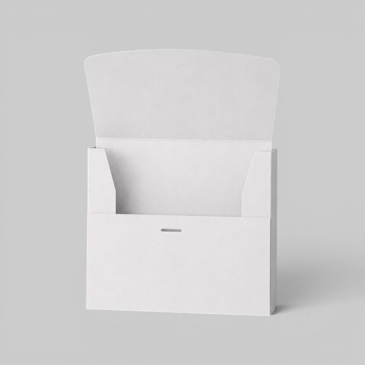 Stockka white matte coated cardboard box with front opening and internal tabs for secure closure. Ideal for marketing kits or small product sets.