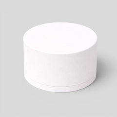 Stockka white textured cardboard cylindrical jewelry box with removable lid, perfect for bracelets or watches.