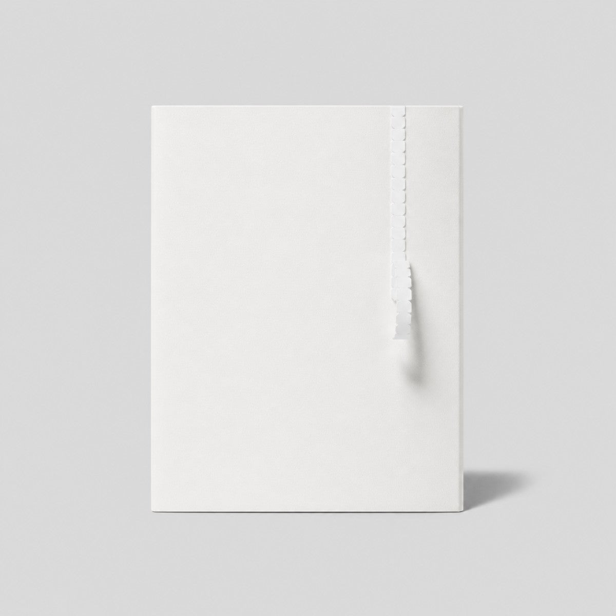 Stockka elegant white corrugated cardboard document folder with a unique tear-off zipper closure for important papers.