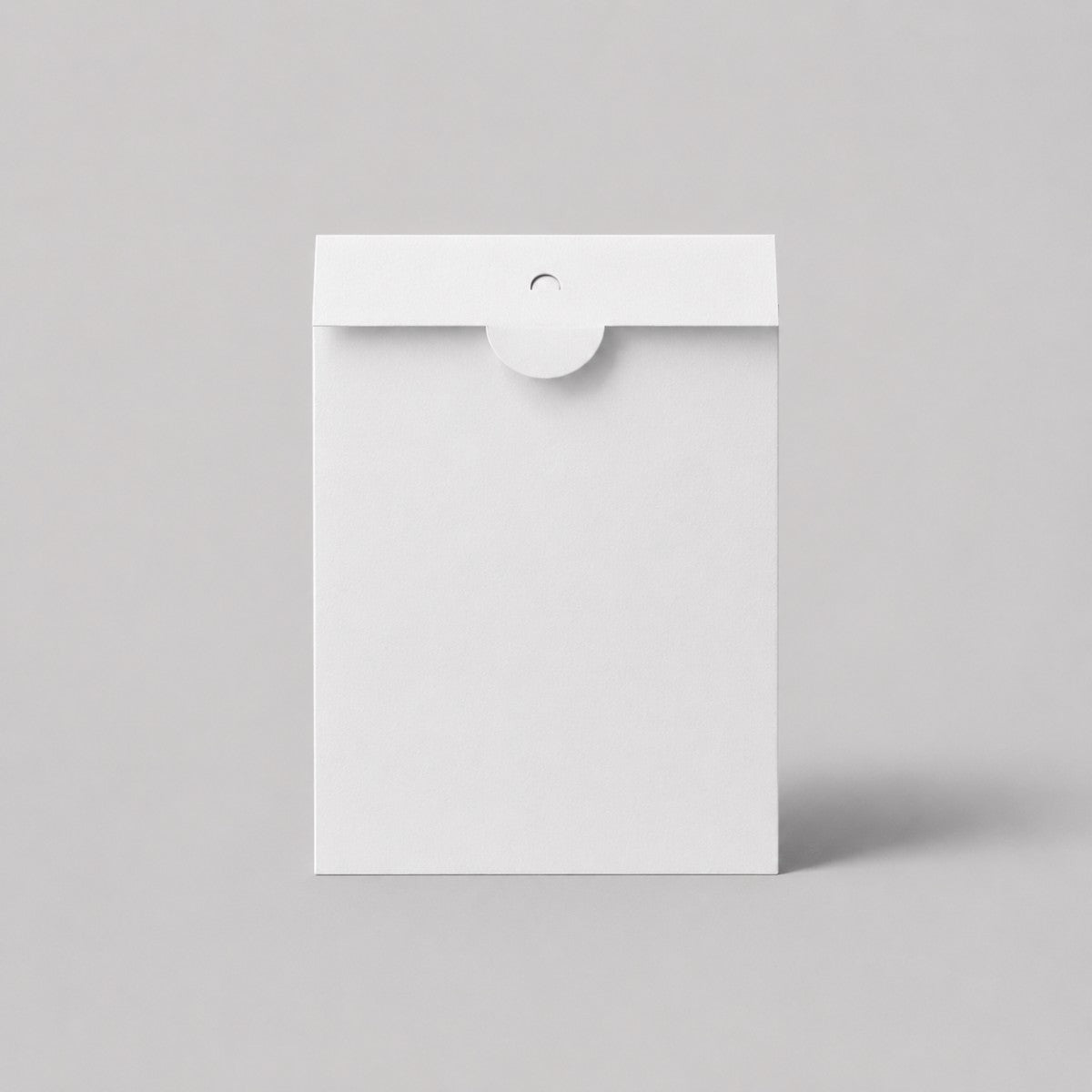 Stockka white matte coated cardboard envelope with round tuck-lock closure for greeting cards and invitations.