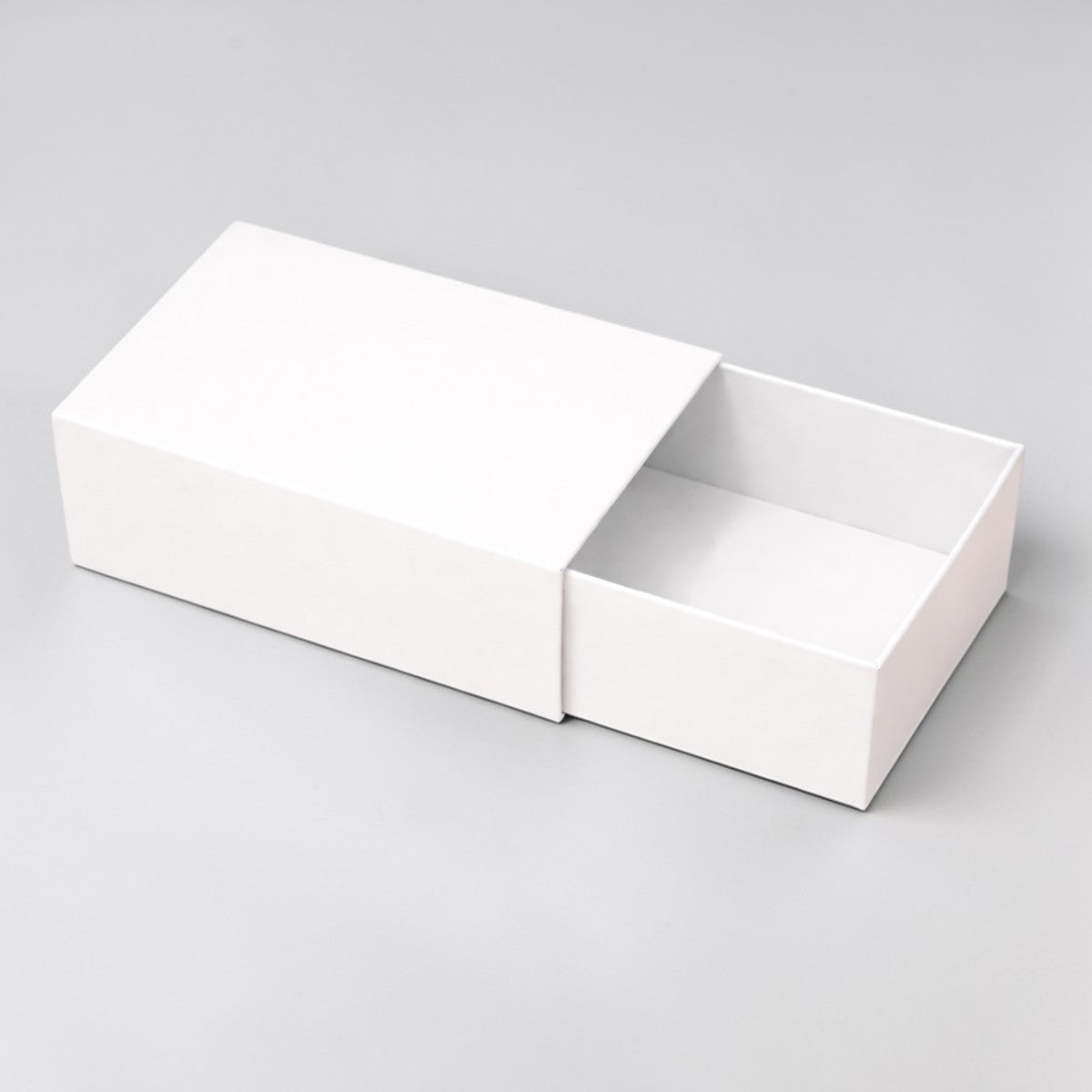 Stockka white coated cardboard gift box with drawer style opening, 400gsm. Ideal for jewelry or luxury items.