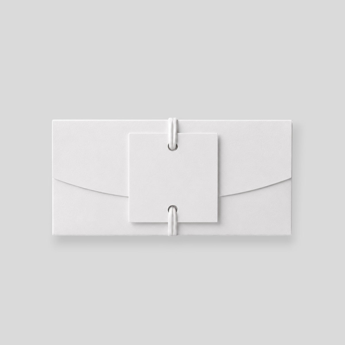 Stockka white paper gift envelope with double ribbon closure and external card for messages or gift cards.