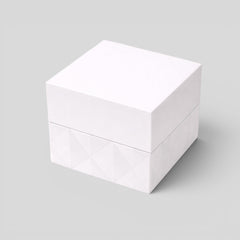 Stockka white cubic jewelry box with removable lid, matte finish, geometric pattern on base.