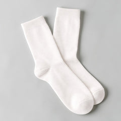 Stockka white mid-calf socks made of cotton and spandex, offering comfort and breathability for casual wear.