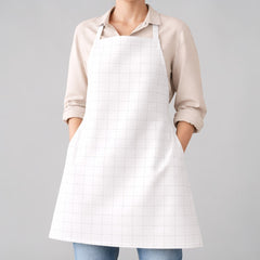 Stockka minimalist full-length white apron with subtle grid pattern. Polyester-cotton blend, ideal for kitchens, bakeries, and cafes.