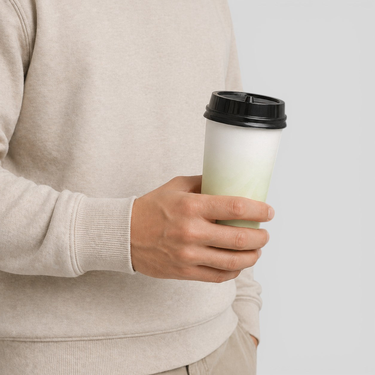 Stockka white paper cup with black lid, ideal for takeaway coffee or tea. Clean design for branding.
