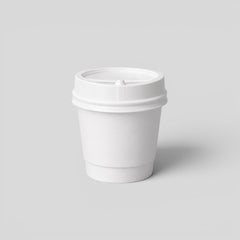 Stockka small white paper espresso cup with a black plastic lid, ideal for events.