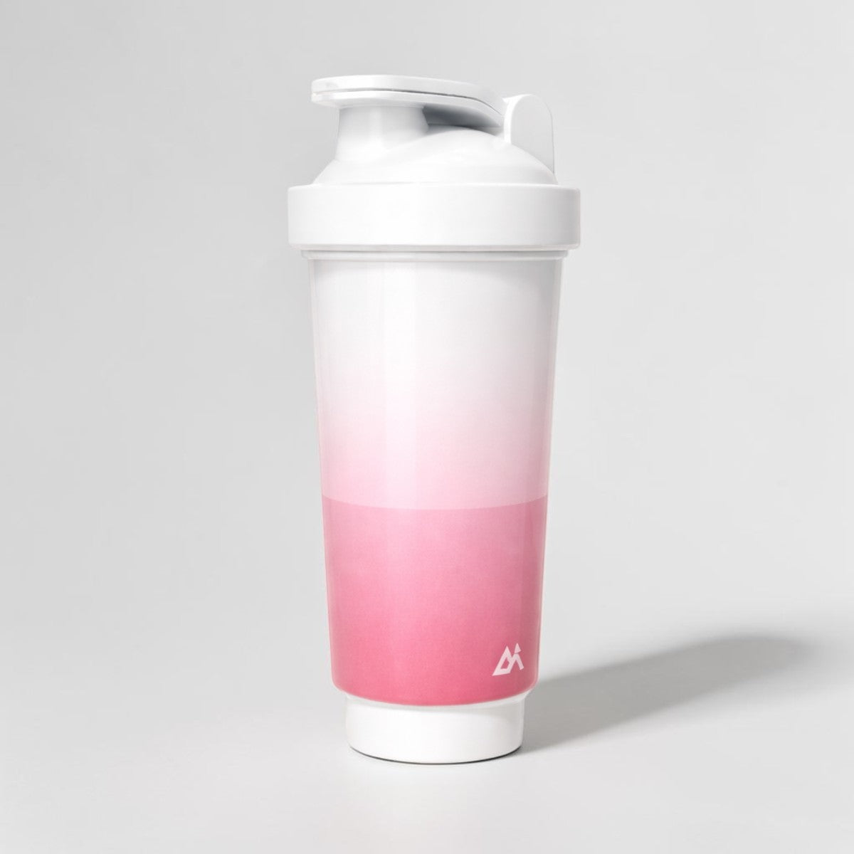 Stockka white and pink ombre BPA-free plastic shaker bottle with patent lid. Ideal for protein shakes.